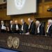 Judges of the International Court of Justice arrive in the courtroom during the first day of the witnesses in the Croatia vs. Serbia case in the Peace Palace in The Hague, The Netherlands, on March 2014. Croatia accuses neighbouring country Serbia of committing genocide in the nineties at the breakup of Yugoslavia. AFP PHOTO/ANP BART MAAT netherlands out        (Photo credit should read BART MAAT/AFP/Getty Images)