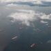 Ships wait to enter the Panama Canal on Wednesday, May 18, 2022.