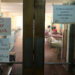 A sign that reads "There is no water" (top L) is seen at the Central University of Venezuela (UCV) hospital in Caracas, Venezuela August 14, 2018. Picture taken August 14, 2018. REUTERS/Marco Bello - RC182254C770