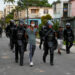 A man is arrested during a demonstration against the government of President Miguel Diaz-Canel in Arroyo Naranjo Municipality, Havana on July 12, 2021. - Cuba on Monday blamed a "policy of economic suffocation" of United States for unprecedented anti-government protests, as President Joe Biden backed calls to end "decades of repression" on the communist island. Thousands of Cubans participated in Sunday's demonstrations, chanting "Down with the dictatorship," as President Miguel Díaz-Canel urged supporters to confront the protesters. (Photo by YAMIL LAGE / AFP)