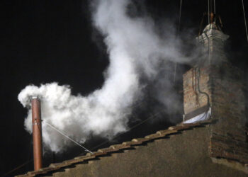 White smoke emerges from the chimney on the roof of the Sistine Chapel, in St. Peter's Square at the Vatican, Wednesday, March 13, 2013. The white smoke indicates that the new pope has been elected. (Photo by Gregorio Borgia/AP Photo)
