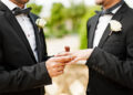 Gay Couple Exchanging Rings at Wedding